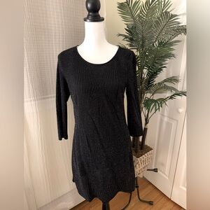 Black long sleeve sparkly mini dress.